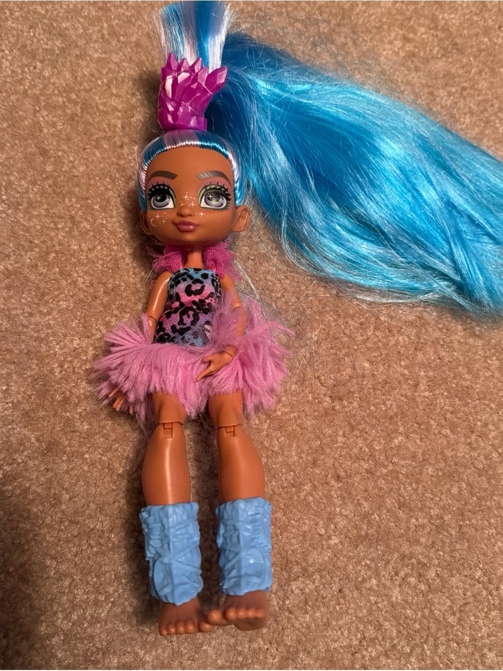 Mattel Cave Club Tella doll featuring bright blue hair pink feathered dress 8"